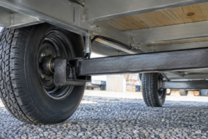 Read more about the article Torsion Axle vs. Leaf Spring Axle Trailers: Which is Right for You?